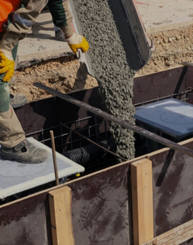 Pouring concrete into a form